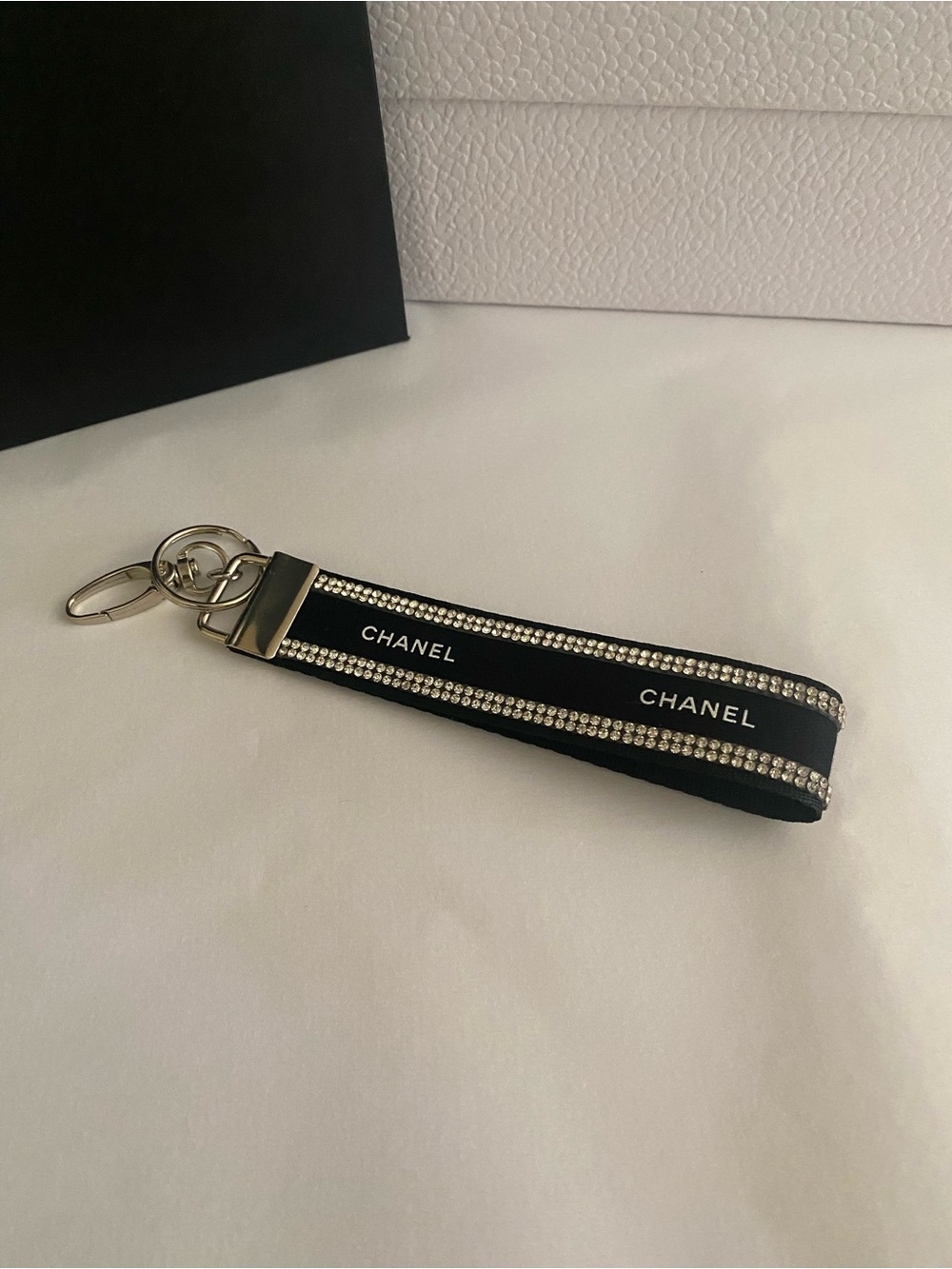 CHANEL Ribbon Black Crystal-Trim Logo Wrist Key Holder
